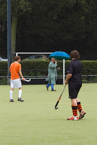 Sep 17 - Referee with umbrella