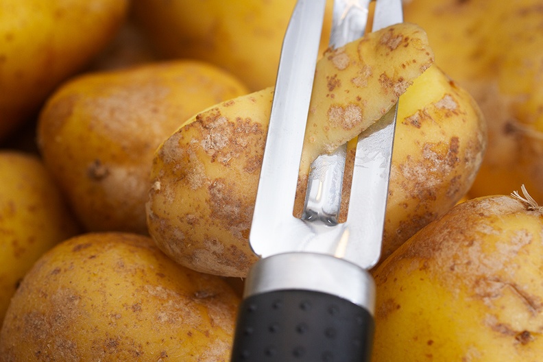 Short pause to make a photo while peeling potatoes