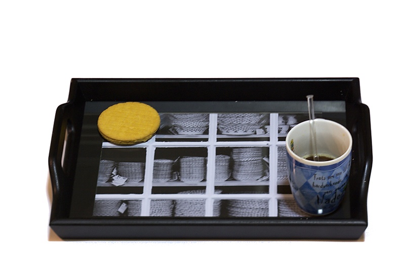 A tray with a photoframe as bottom. Added one of my photos to it.