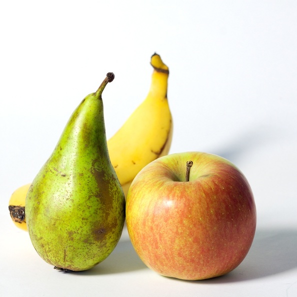 A simple composition of an apple, pear and banana.
