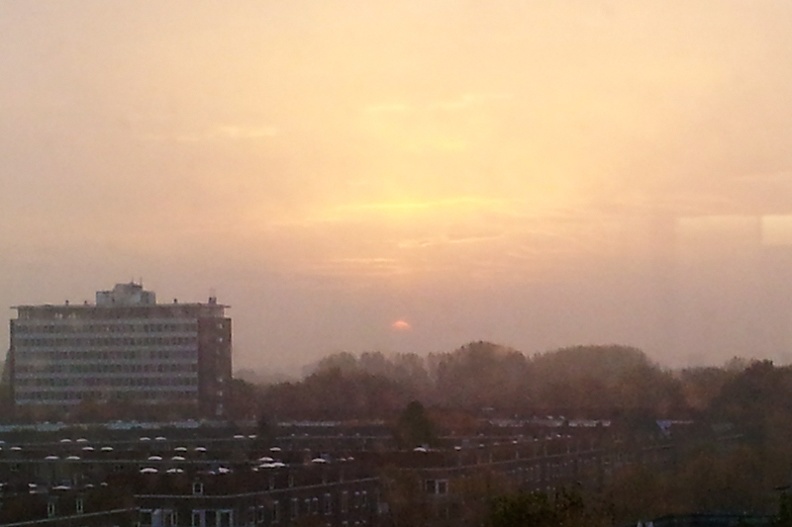 Sunset in Amsterdam tonight (made through a window)