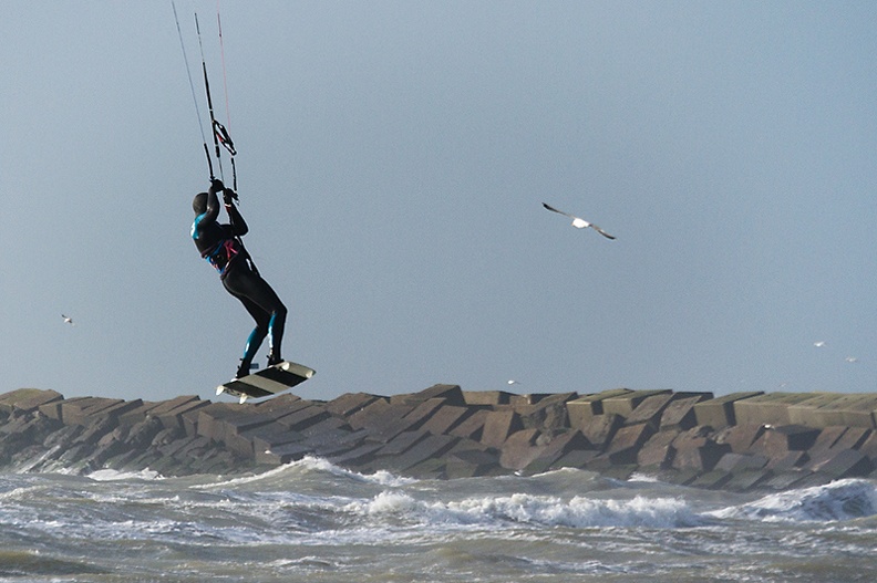 Kite surfer on a nice afternoon at the beach today. Lots of wind and sand.
