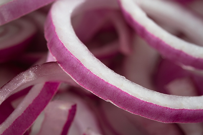 Just a detail of red onion rings while making a pepper burger.