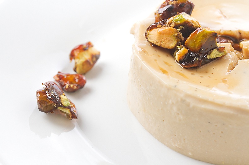 Dessert today. Espresso panna cotta with roasted pistachio mixed with honey