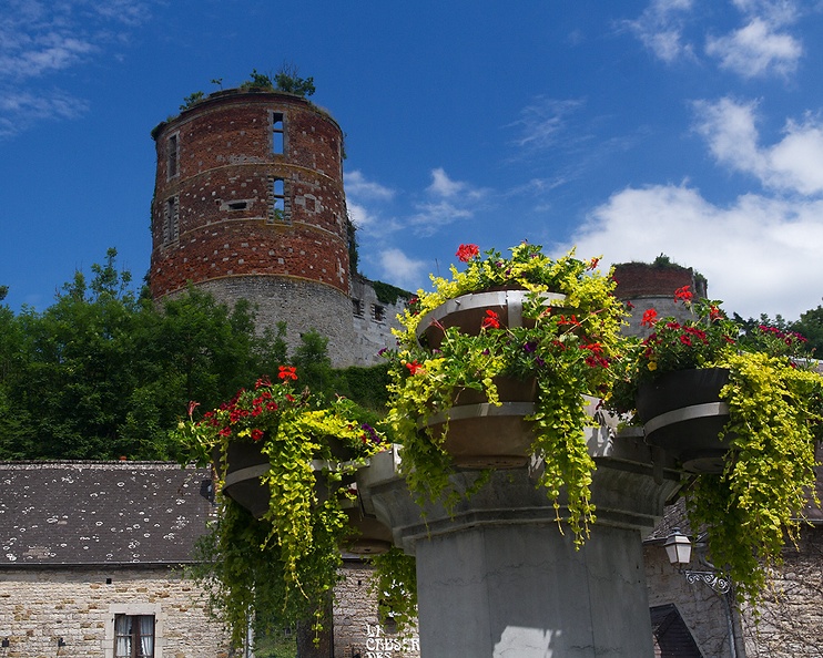 Old castle in Hierges, France on a very hot afternoon