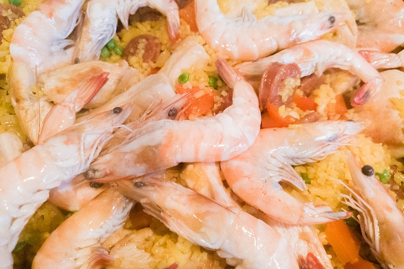 Making a kind of paella with shrimps and chorizo.
