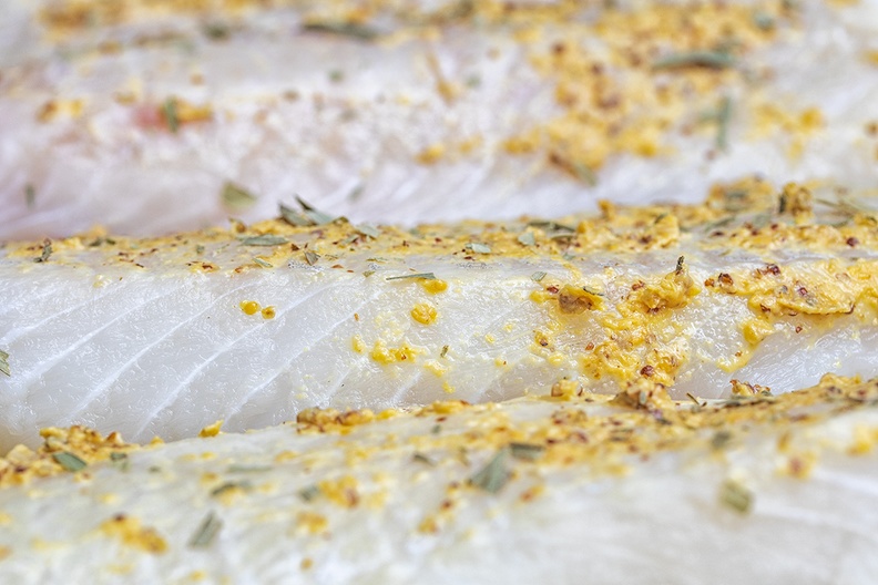 Cod with (zaanse) mustard and dried tarragon. Ready for baking..