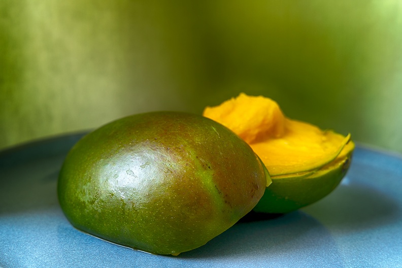 A mango, cut in half. On the menu today