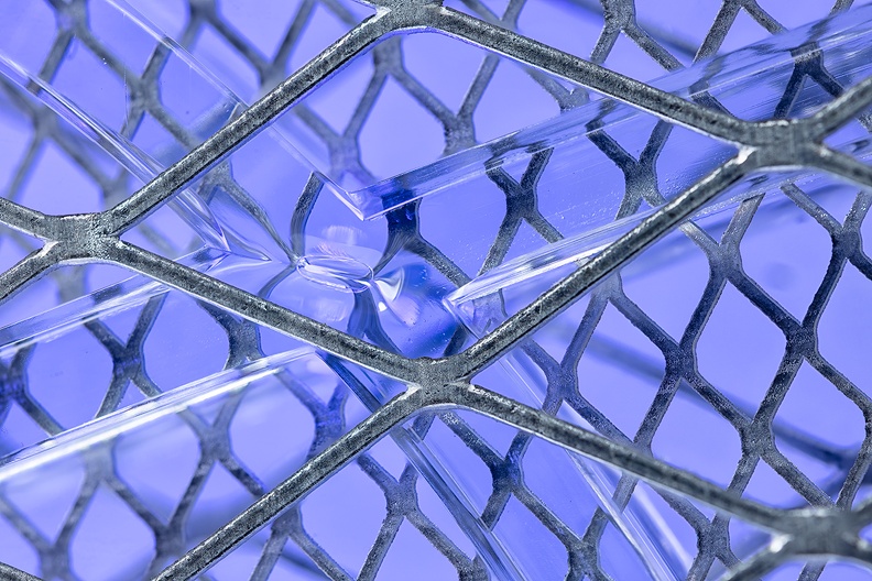 Detail of an electric fly and mosquito swatter with UV light