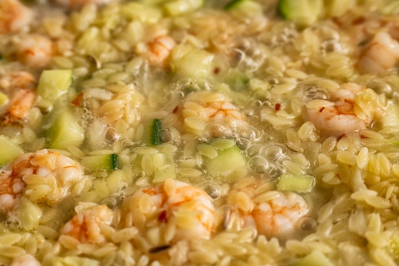 Orzo with shrimps and zucchini. Added feta and parsley afterwards