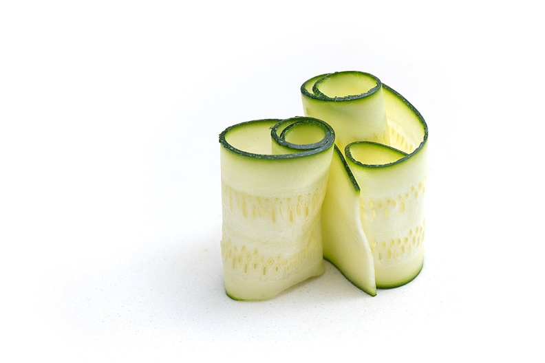 Playing with courgette slices in my kitchen before using them for dinner