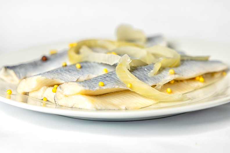 A plate with pickled herring