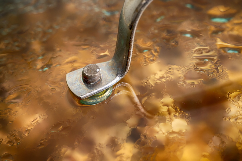 Part of a lid with a stewing stew below it