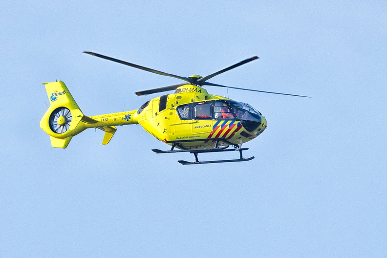 An air ambulance flying over